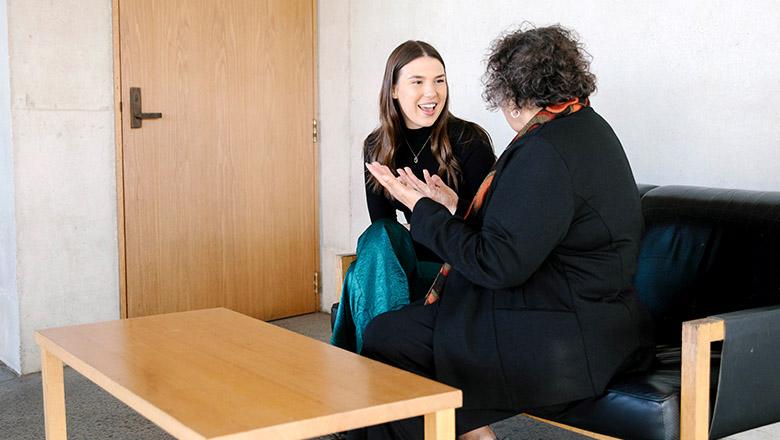 Professor Tracey Bunda and UQ student, Sylvia Stuen-Parker sit chatting