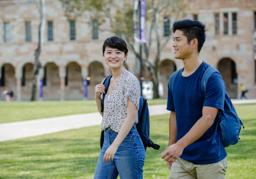 Students walking through The University of Queensland's Great Court