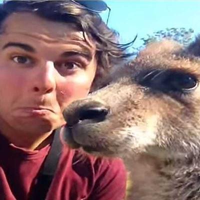 A selfie of Patrick Manderson with a kangaroo