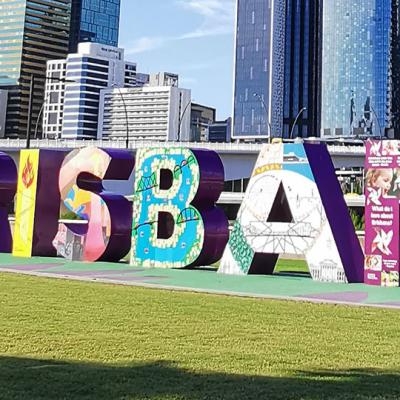 Brisbane sign with city in the background
