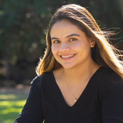 Claudia smiling towards camera in the Great Court