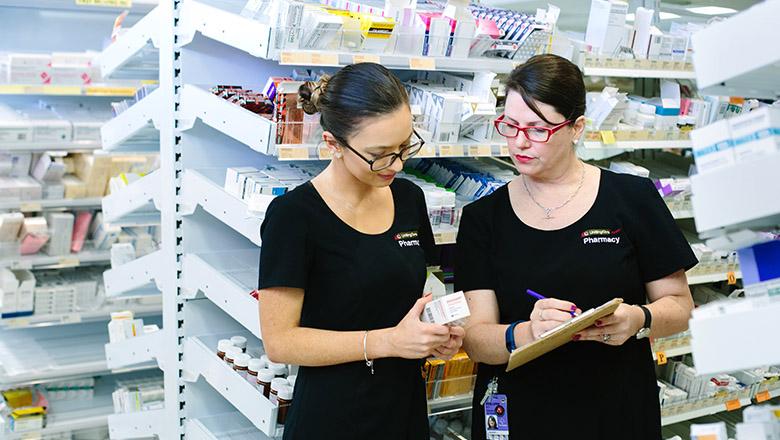 A student pharmacist gets hands on experience in a chemist