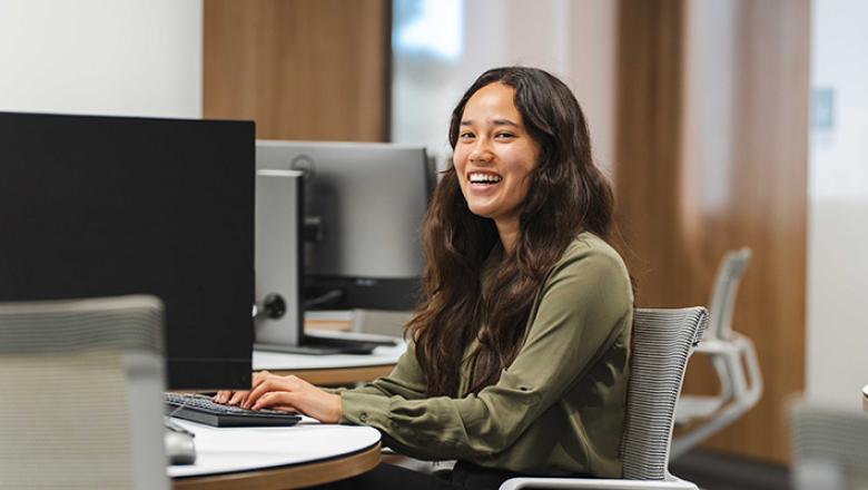 Master of Business student working in the computer lab. 