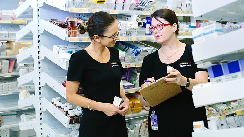 Two pharmacists working together