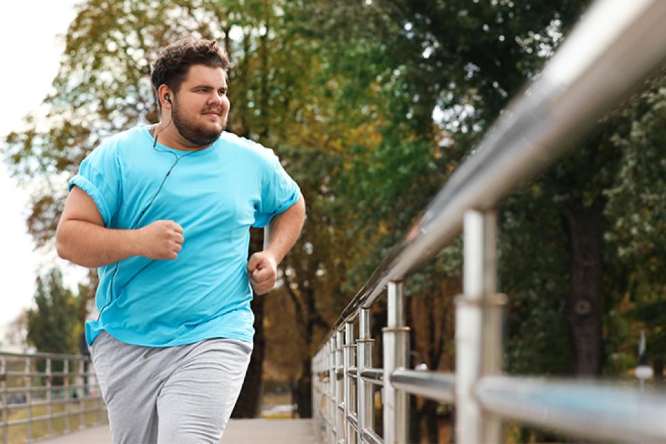 Man exercising to improve body image positivity