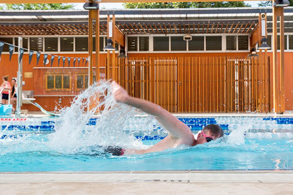 Student swimming at UQ Gatton campus