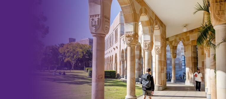 Students walking through the cloisters of UQ's Great Court