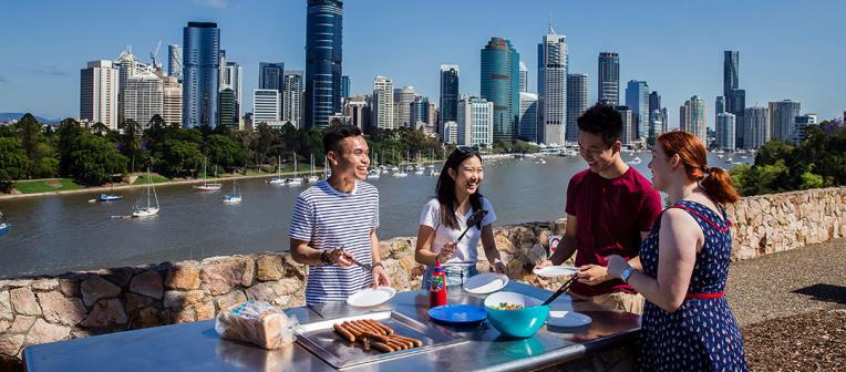 Students enjoying a BBQ at Kangaroo Point, Brisbane, Australia. 