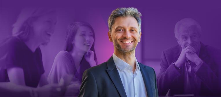 Mature business student and other students on a purple background. 