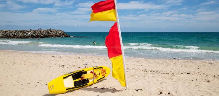 Surf lifesaver ski and flag on the beach in Australia