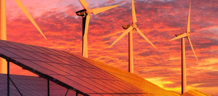 sustainable energy image with windmills and solar panels