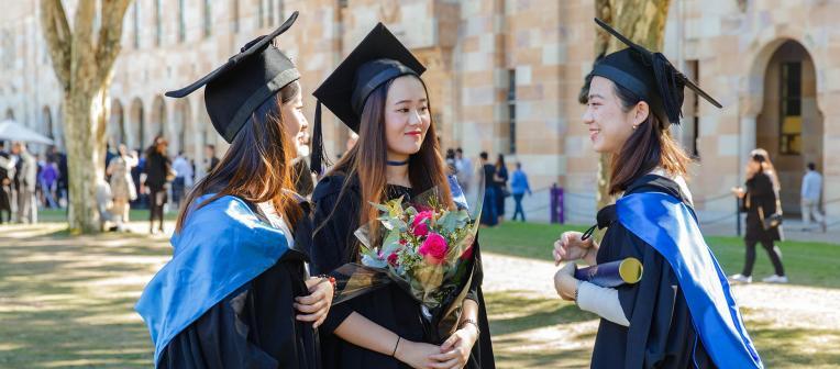 3 grads in the Great Court