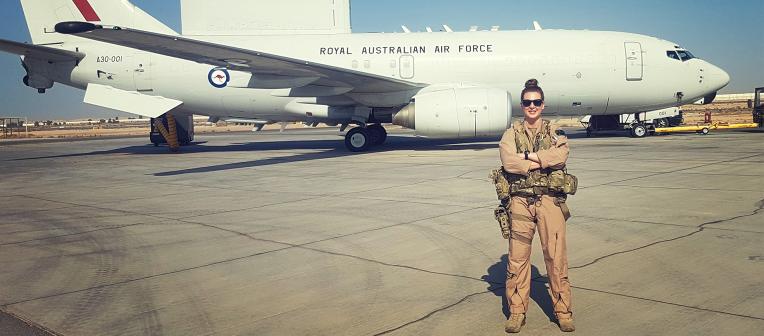 MBA scholarship recipient Kellie Davis in front of RAAF plane