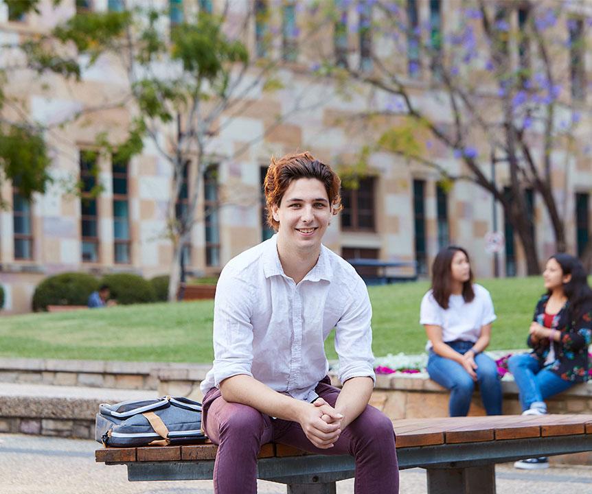 Student sitting on bench