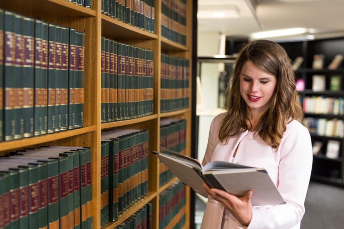 Female student in the law library 