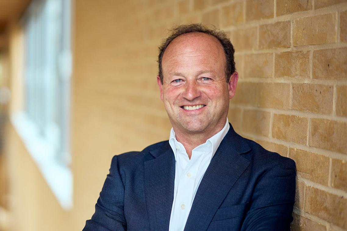 Professional headshot of Rupert Younger.